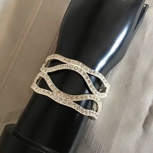 Sparkle as you wear this Silver and clear beaded cuff bracelet